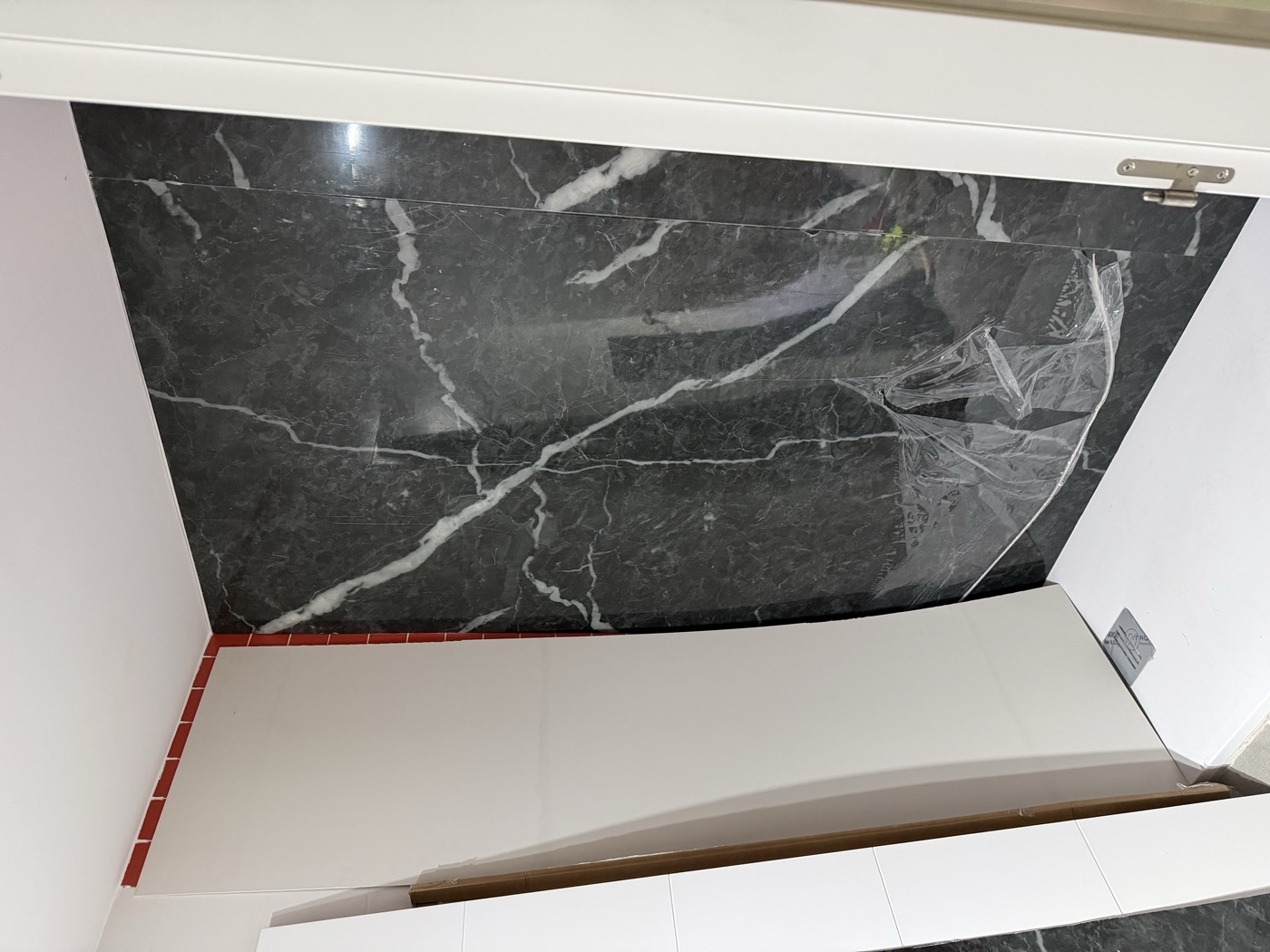Vinil marbre bany